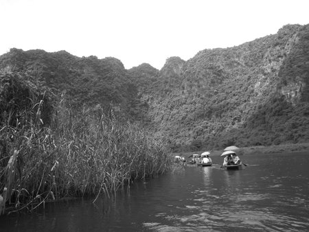 NINH BINH, VIETNAM, JULY, 20: Unidentified tourists in Trang An  on JULY, 20, 2013. Trang An is the scenic area, ranked special of Vietnam.のeditorial素材