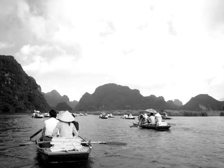 NINH BINH, VIETNAM, JULY, 20: Unidentified tourists in Trang An  on JULY, 20, 2013. Trang An is the scenic area, ranked special of Vietnam.のeditorial素材
