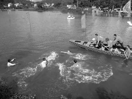 HAI DUONG, VIETNAM, March 2: The men exam catching ducks in the lake on March 2, 2013 in Kiep Bac %u2013 Con Son festival, Chi Linh, Hai Duong, Vietnam. Kiep Bac %u2013 Con Son festival is the most traditional festival, unique in Vietnam, held in spring aのeditorial素材