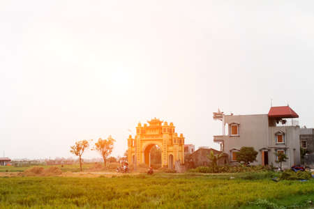 HAI DUONG, VIETNAM, JULY 30: Gate in vietnamese rural village on july, 30, 2014 in Hai Duong, Vietnam. This is special characteristics of rural Vietnamのeditorial素材
