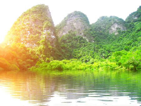 NINH BINH, VIETNAM, JULY, 20: Unidentified tourists in Trang An  on JULY, 20, 2013. Trang An is the scenic area, ranked special of Vietnam.のeditorial素材