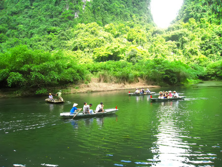 NINH BINH, VIETNAM, JULY, 20: Unidentified tourists in Trang An  on JULY, 20, 2013. Trang An is the scenic area, ranked special of Vietnam.のeditorial素材