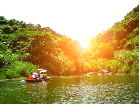 NINH BINH, VIETNAM, JULY, 20: Unidentified tourists in Trang An  on JULY, 20, 2013. Trang An is the scenic area, ranked special of Vietnam.のeditorial素材