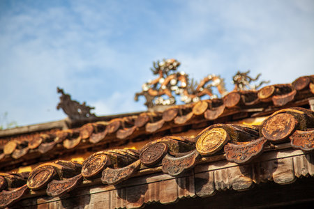 Traditional Chinese roof tiles in an ancient Chinese temple, closeup of photoの写真素材