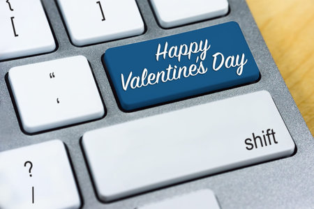 Written word Happy Valentine's Day on blue keyboard button. Valentine's Day and Love Concepts