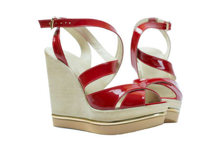 A pair of red women's sandalsの写真素材