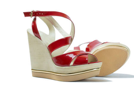 A pair of red women's sandalsの写真素材