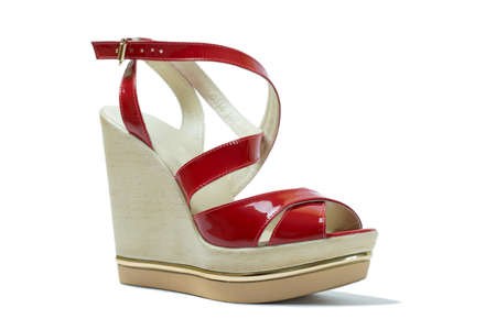 A pair of red women's sandalsの写真素材