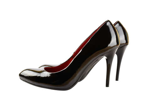 Women's leather shoes with high heels in the business style isolated on white backgroundの写真素材