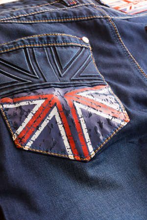 Blue jeans with a British flag on the pocketの写真素材