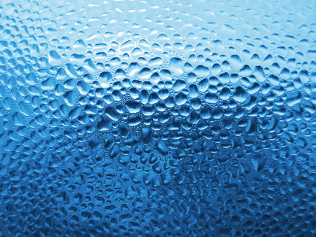 natural water drops on window glass background