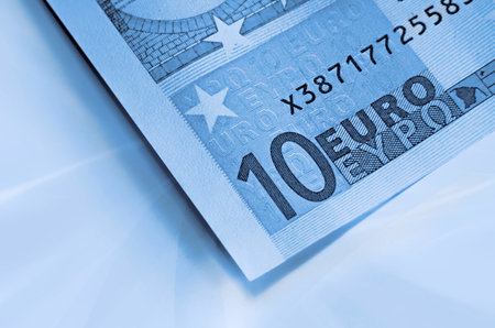 fragment of ten euro money, blue abstract backgroundの写真素材