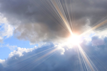 grey clouds and bright sunlight on sky backgroundの写真素材