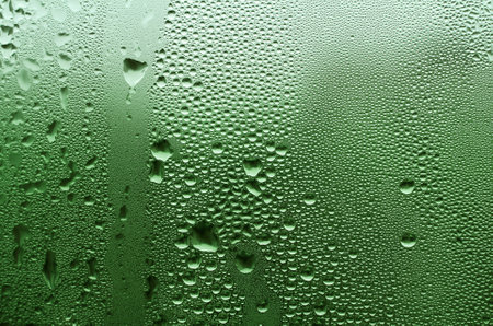natural large and fine water drops on glassの写真素材
