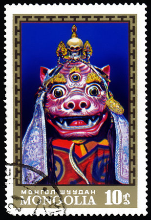 MONGOLIA - CIRCA 1971: A stamp printed in MONGOLIA, shows Cham Dance, mask, circa 1971の写真素材