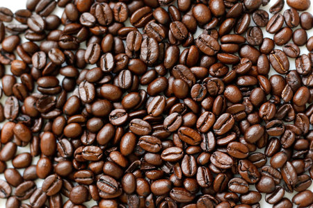 Food background of roast whole bean of arabica coffee