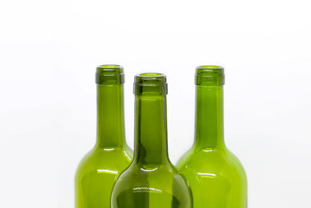 Three green empty bottles isolated on a white backgroundの写真素材