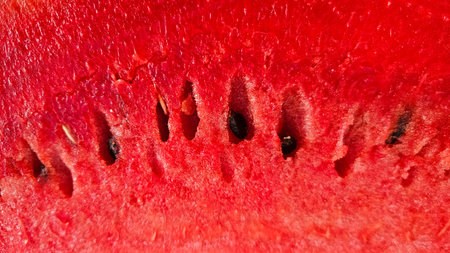 Close-up of ripe fresh sweet juicy watermelon, natural food background, watermelon pulp textureの写真素材