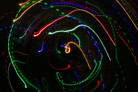 Abstract background with pattern from colorful traces or trajectory of lights