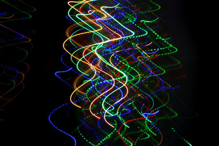 Abstract blurry background with pattern from colorful traces or trajectory of lightsの写真素材