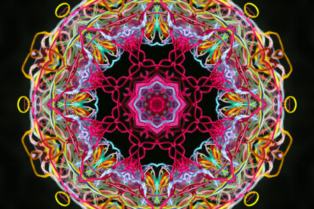 Abstract pattern of bright multicolored threads on black background with 3D effect