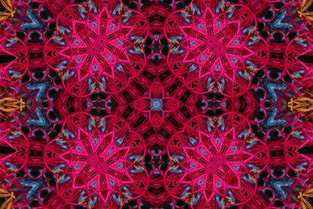 Abstract pattern of bright color threads on black background with 3D effect