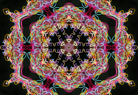 Abstract pattern of bright multicolored threads on black background with 3D effect