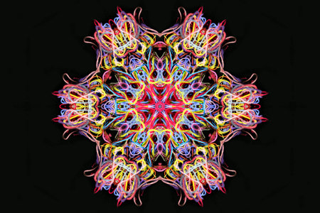 Abstract shape of bright multicolored threads isolated on a black background with 3D effect