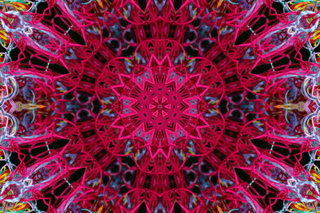 Abstract pattern of bright color threads on black background with 3D effect