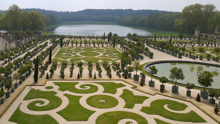 VERSAILLES, PARIS / FRANCE - MAY 05, 2017: The famous gardens of the Royal Palace of Versailles.の写真素材
