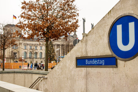 Bundestag, Reichstag, Berlin, Germany, UBahn, metro, station, sign, exit, transportation, urban, city, travel, transit, subway, scene, downtown, life, transport, lifestyle, concept, walking, street, tourism, local, people, public, journey, architecture, background, destination, winter, spring, autumn, cloudy, day, independence, entrance, government, capital, historic, building, connection, Europe, system, parliament, urbanism, democracy, development, unityの写真素材