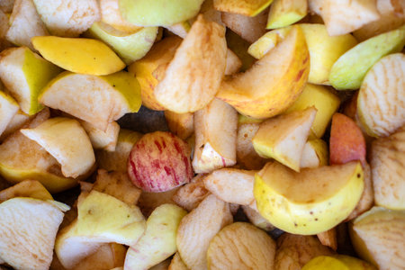 Closeup of freshly chopped apples. Filling for the pie, prepared for baking. Rustic texture,...