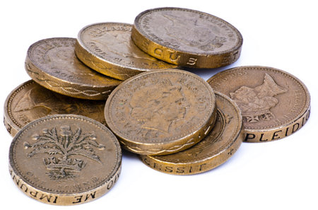 Pound coins in heap cash