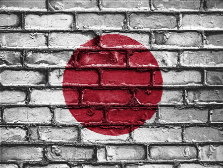 National Flag of Japan on a Brick Wallの写真素材