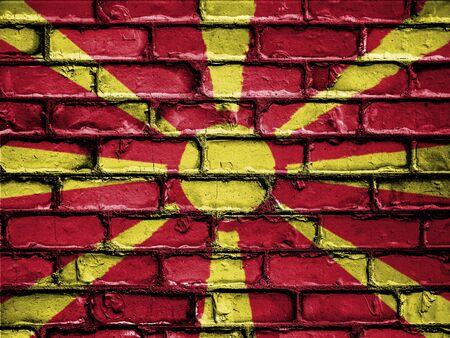 National Flag of Macedonia on a Brick Wallの写真素材