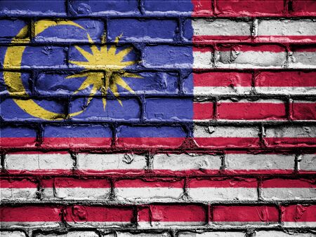 National Flag of Malaysia on a Brick Wallの写真素材