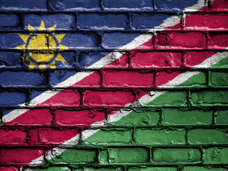 National Flag of Namibia on a Brick Wallの写真素材