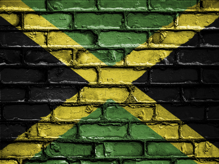 National Flag of Jamaica on a Brick Wallの写真素材