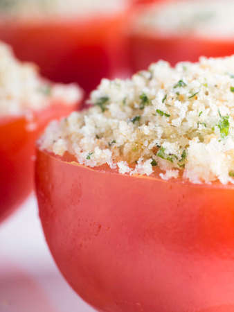 Delicious tomatoes gratin with grated breadの写真素材