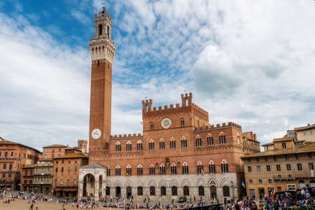 Siena Tuscany, Italy, April, 2018: Public Palace, Palazzo Pubblico in campo Square, Piazza del campo. Siena Tuscany, Italy. High quality photoのeditorial素材