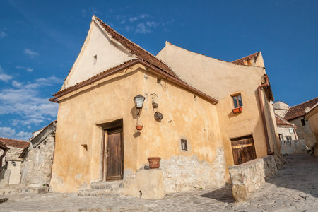 Inside courtyard and old houses of The Rasnov Citadel, little medieval fortress near Brasov city. Transylvania, Romania.のeditorial素材