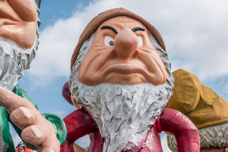 The Grumpy dwarf from Princess Snow White and seven dwarfs tale. Allegorical float during the carnivalのeditorial素材