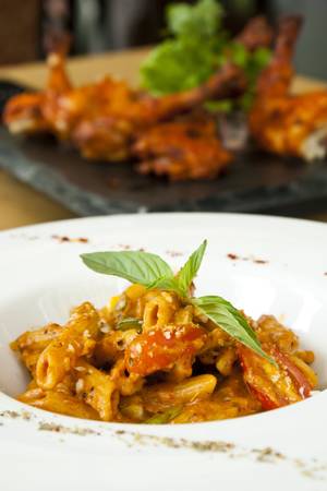 pasta in Indian curry sauceの写真素材