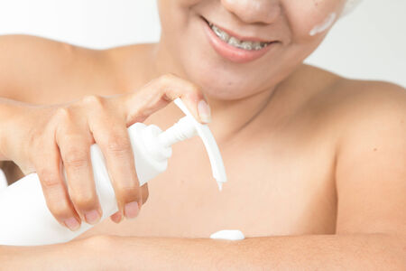 woman with cosmetic skin creamの写真素材