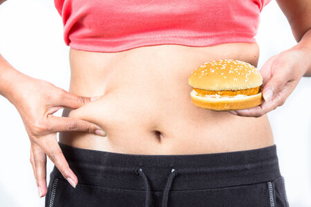 asian woman body with hamburgerの写真素材