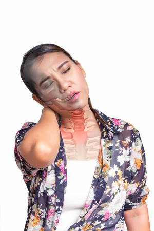 Asian woman with neck pain and see the neck bone.の写真素材