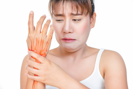 Asian woman having hand pain and see the bone.の写真素材