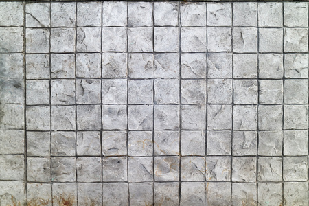 patterned paving tiles cement gray brick floor backgroundの写真素材
