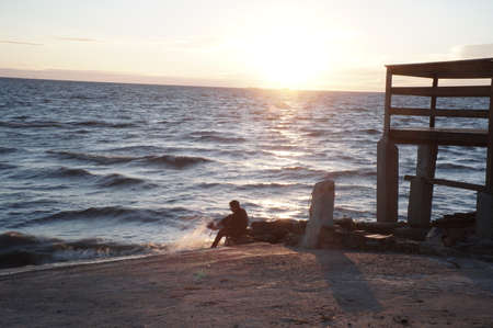 alone early morning on the shore of Silver Riverの写真素材