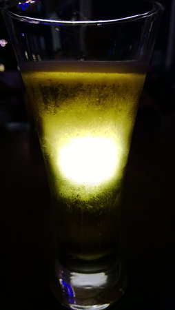 Glass with background lightの写真素材